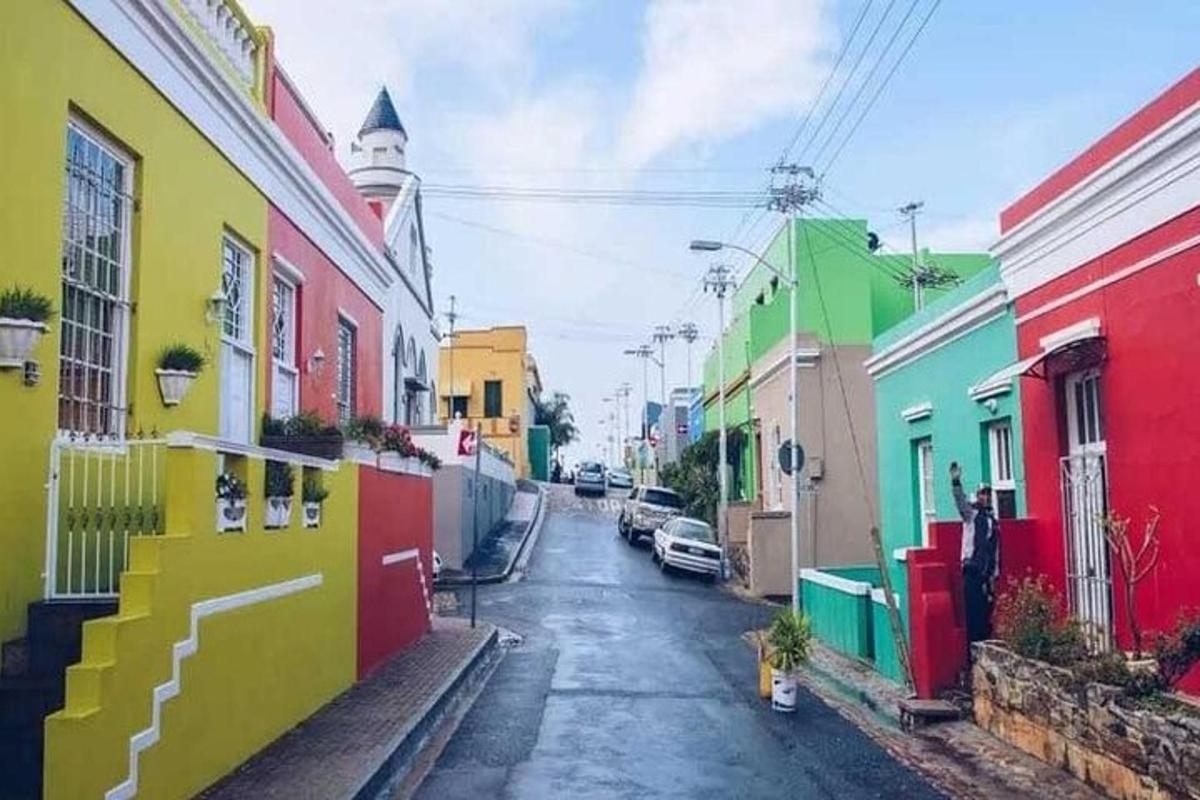 a street with colorful houses on a city street