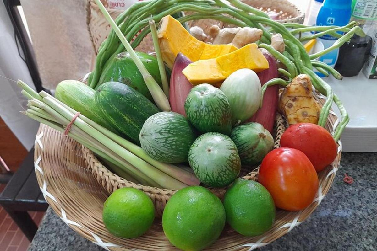 a basket of fruits and vegetables on a counter
