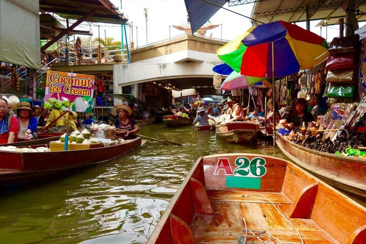 a group of people in boats in a market