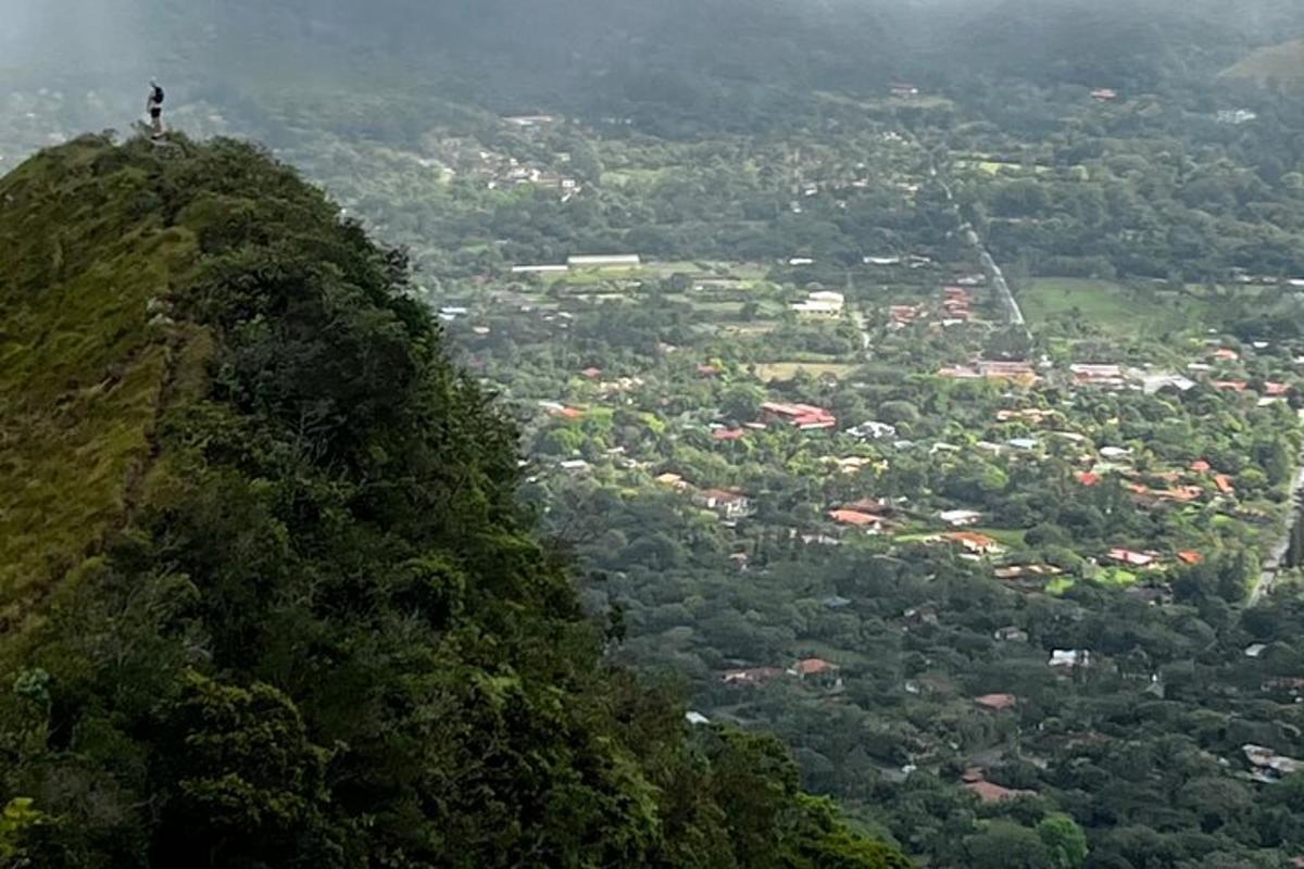 a person standing on top of a mountain