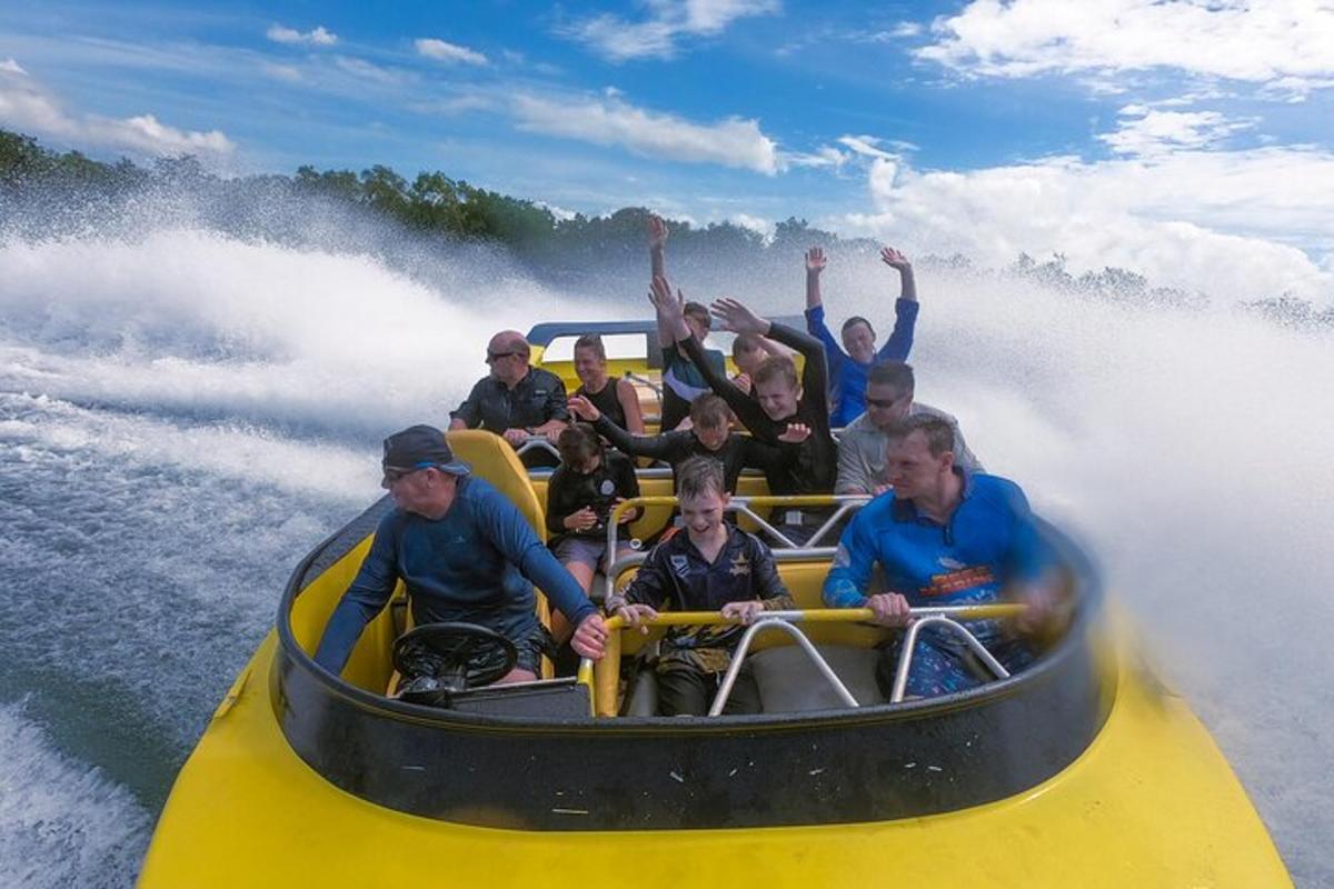 a group of people on a raft in the water
