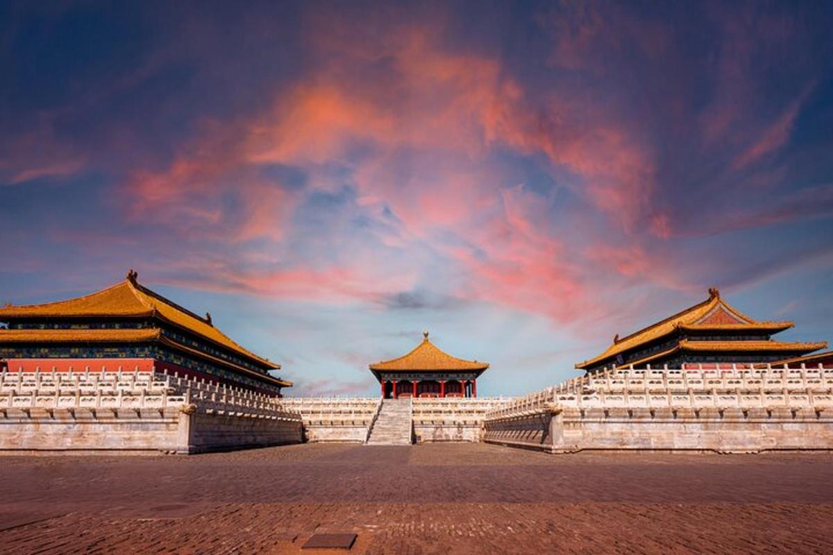 two chinese buildings with a cloudy sky in the background
