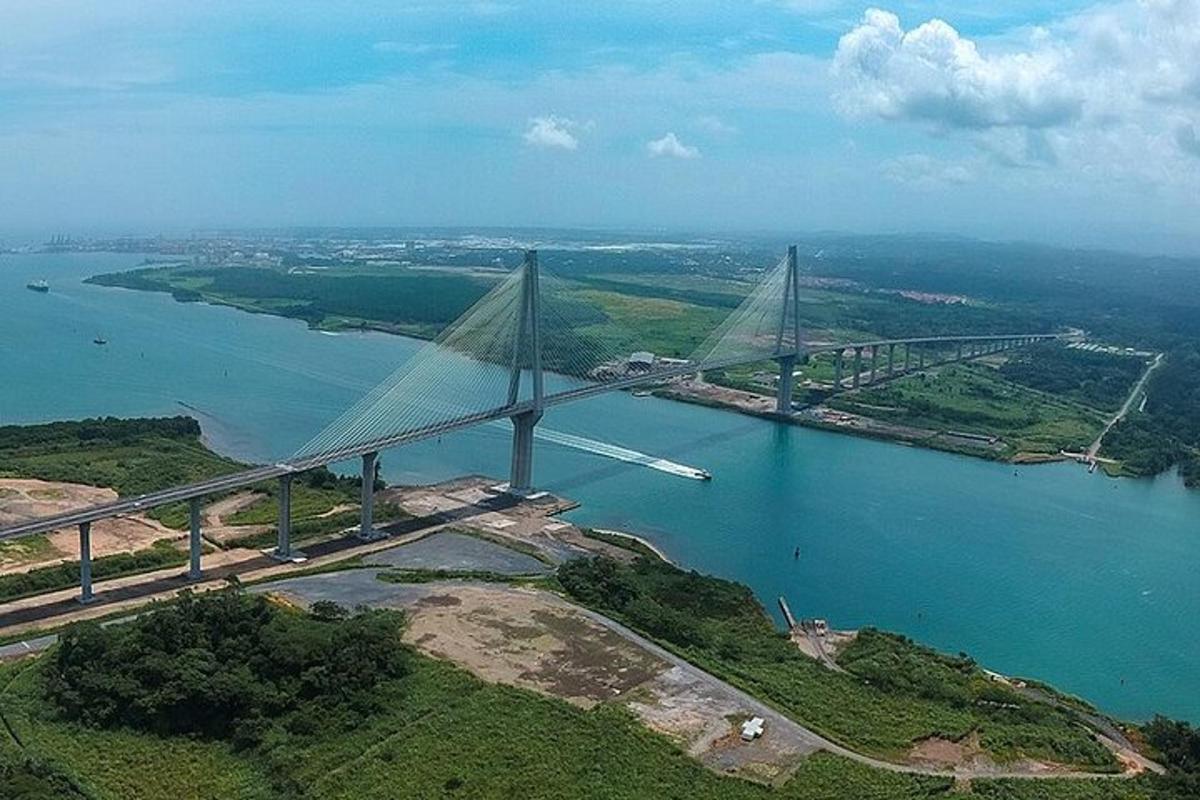 an aerial view of a bridge over a body of water