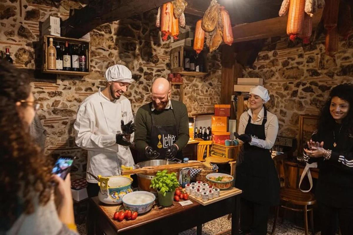a group of people standing in a kitchen preparing food
