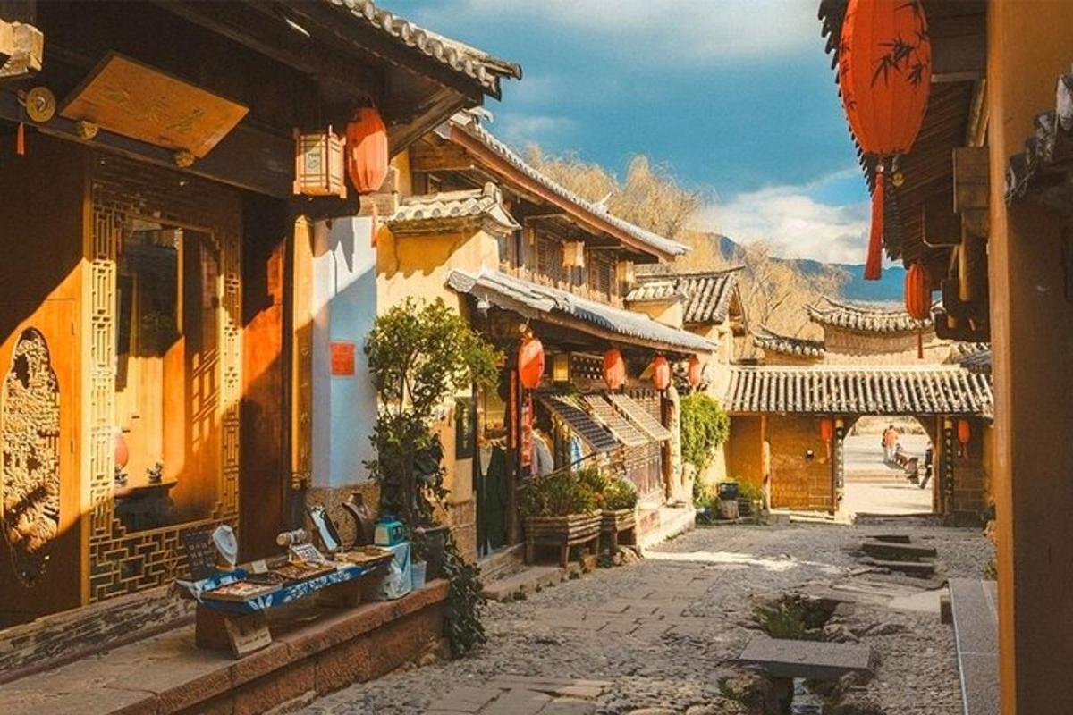 an alley in an asian village with buildings