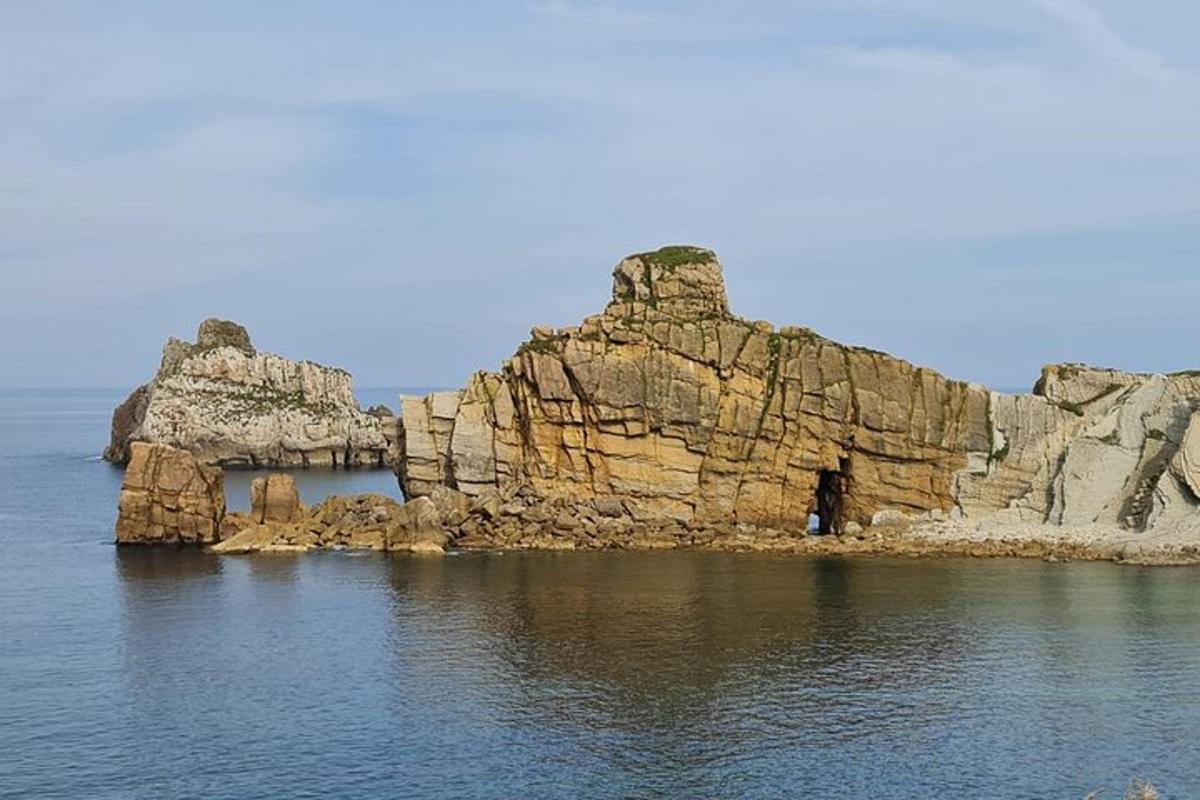 a large rock formation in the water