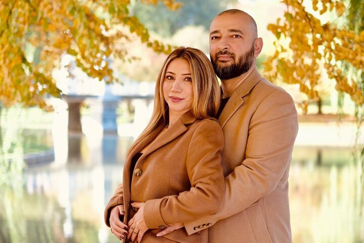 a man and a woman standing next to each other