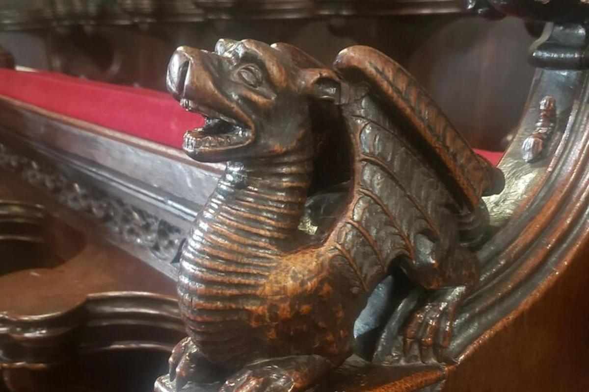 a statue of an elephant with its mouth open