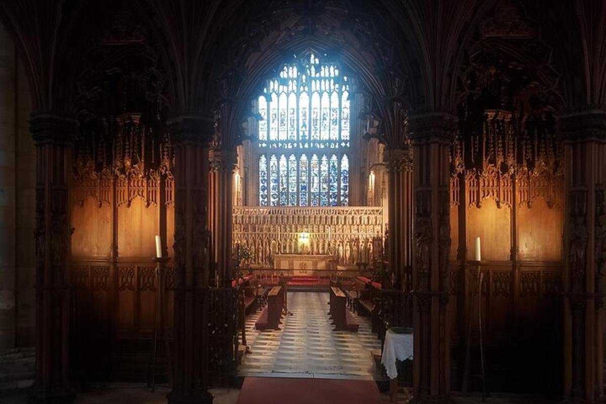 a large cathedral with a large window and a altar