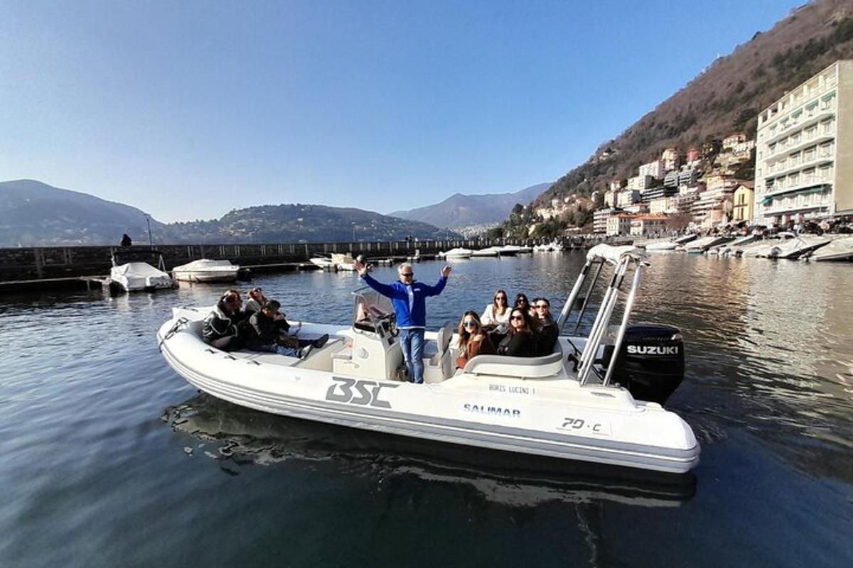 a group of people on a boat in the water