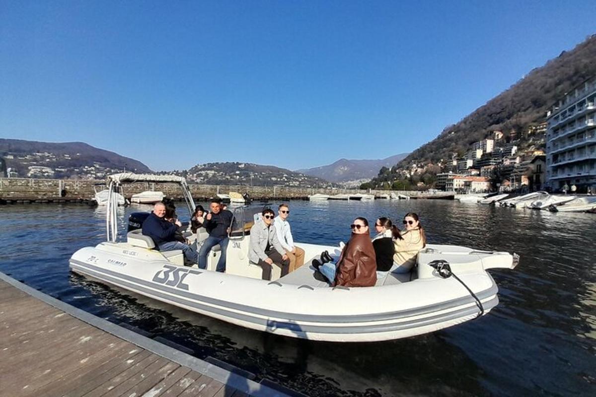 a group of people in a boat on the water