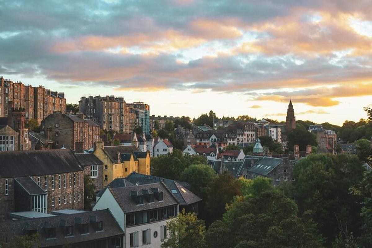 a view of a city at sunset with buildings
