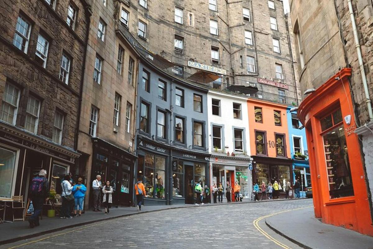 a group of people walking down a city street