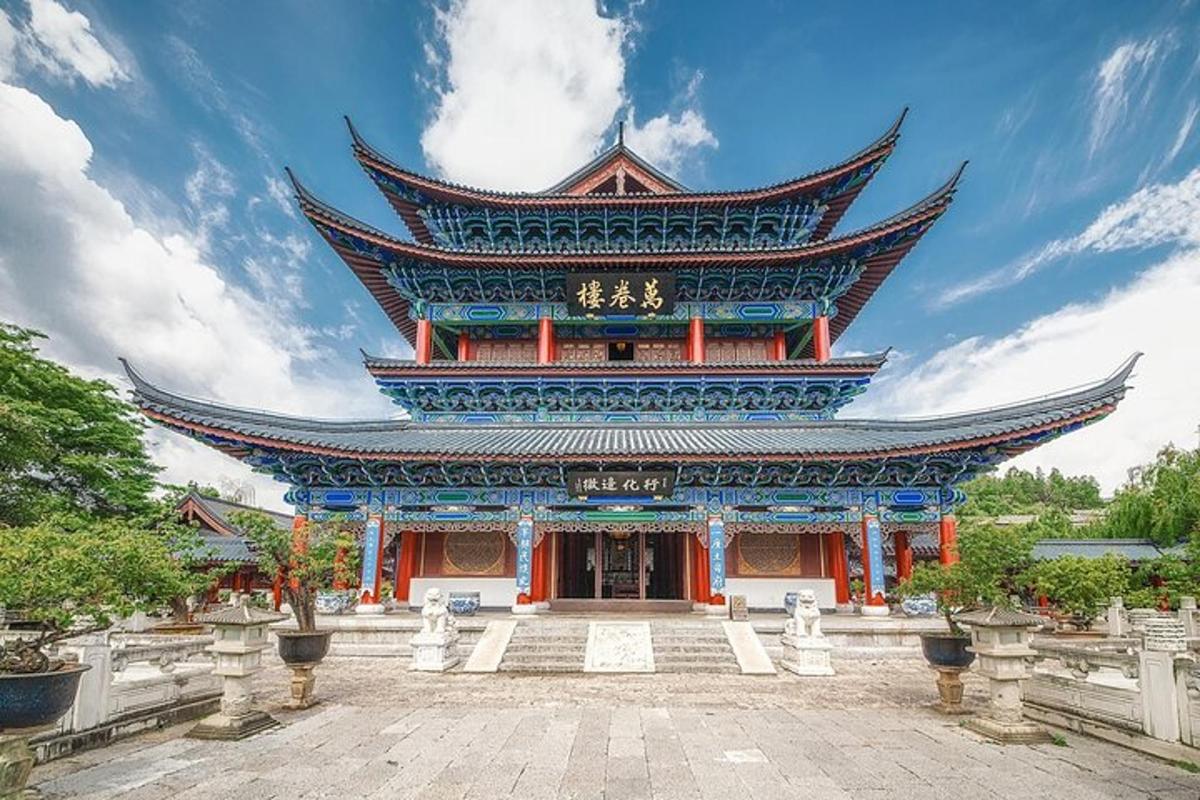 a large building with a sky background with