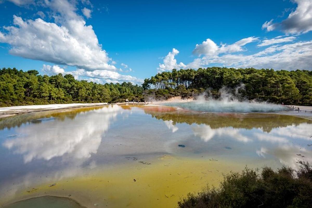 a large body of water with a steam fountain