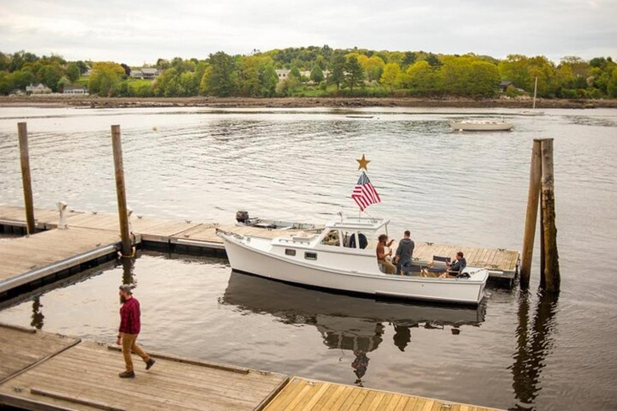 a group of people on a boat at a dock