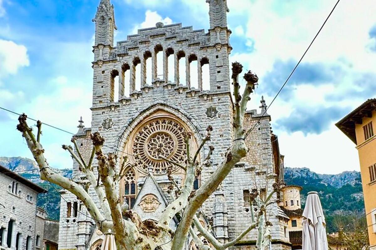 a large stone building with a clock tower