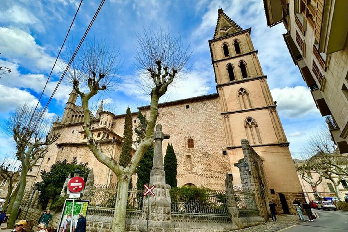 a church with a clock tower and a building