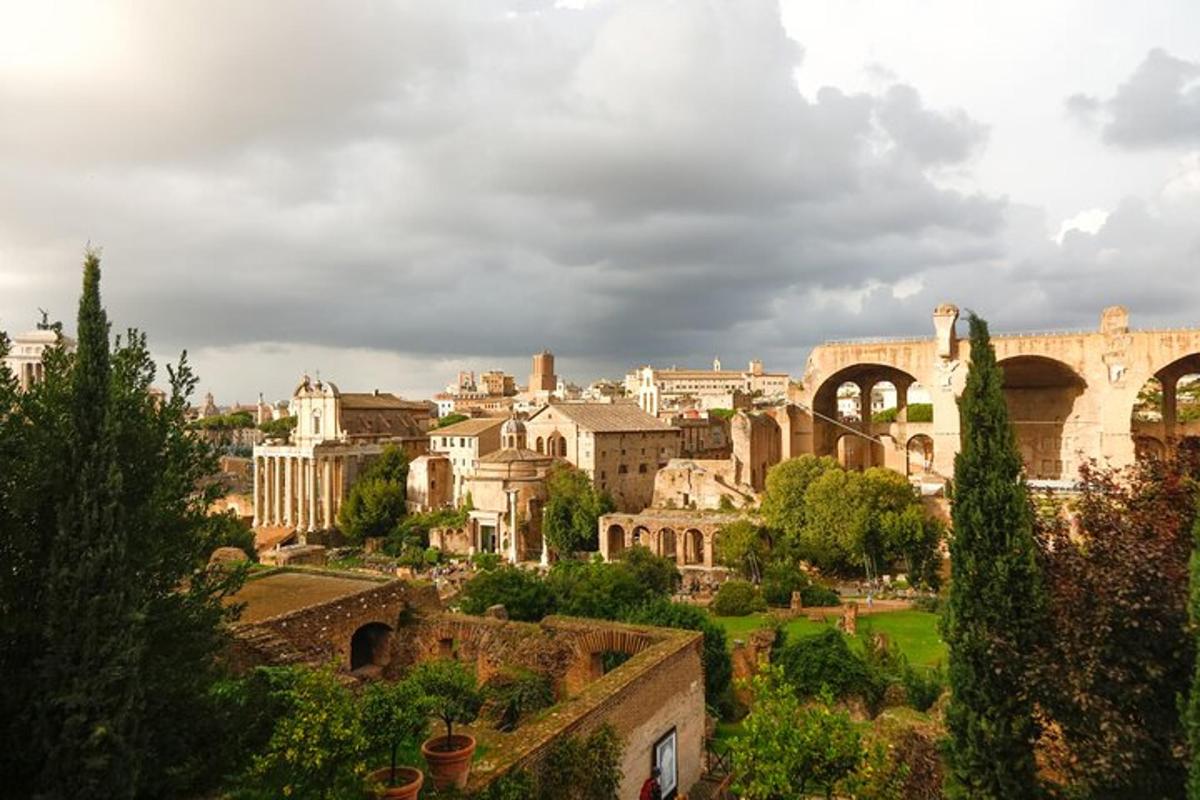 a view of a city with buildings and a cloudy sky