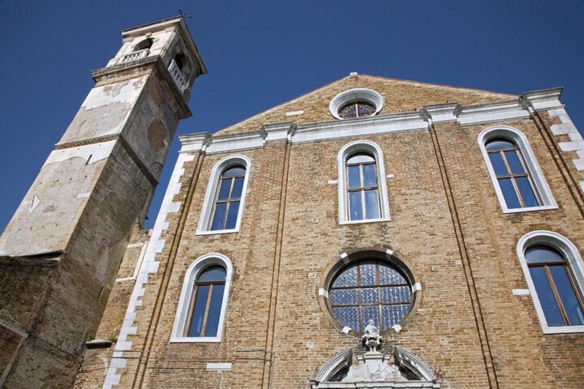a tall brick building with a clock tower