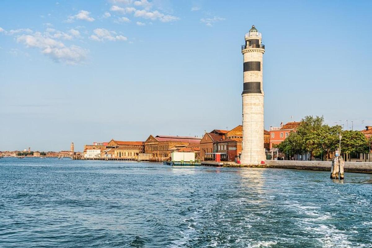 a lighthouse in the middle of a body of water
