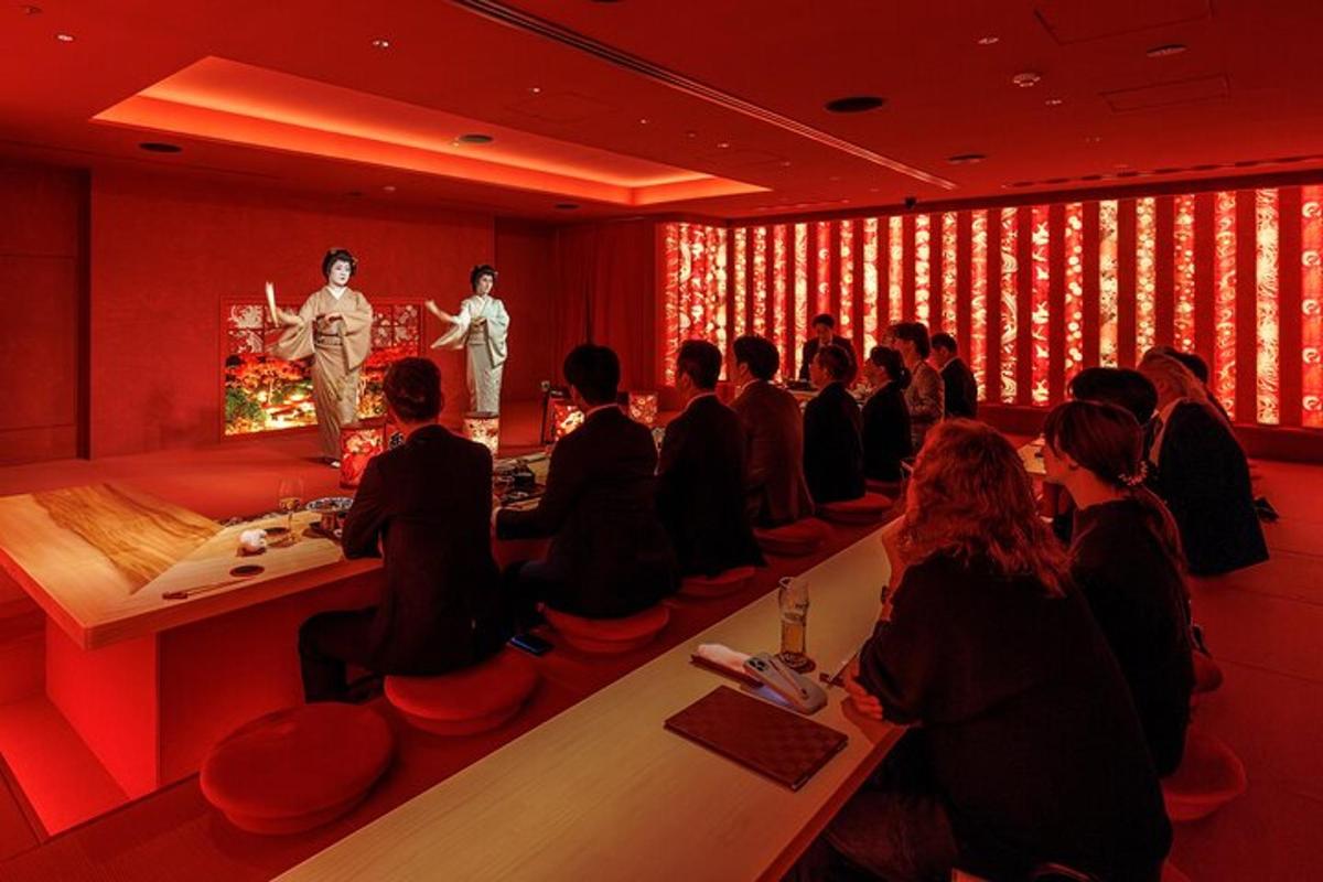 a group of people watching a fashion show in a room