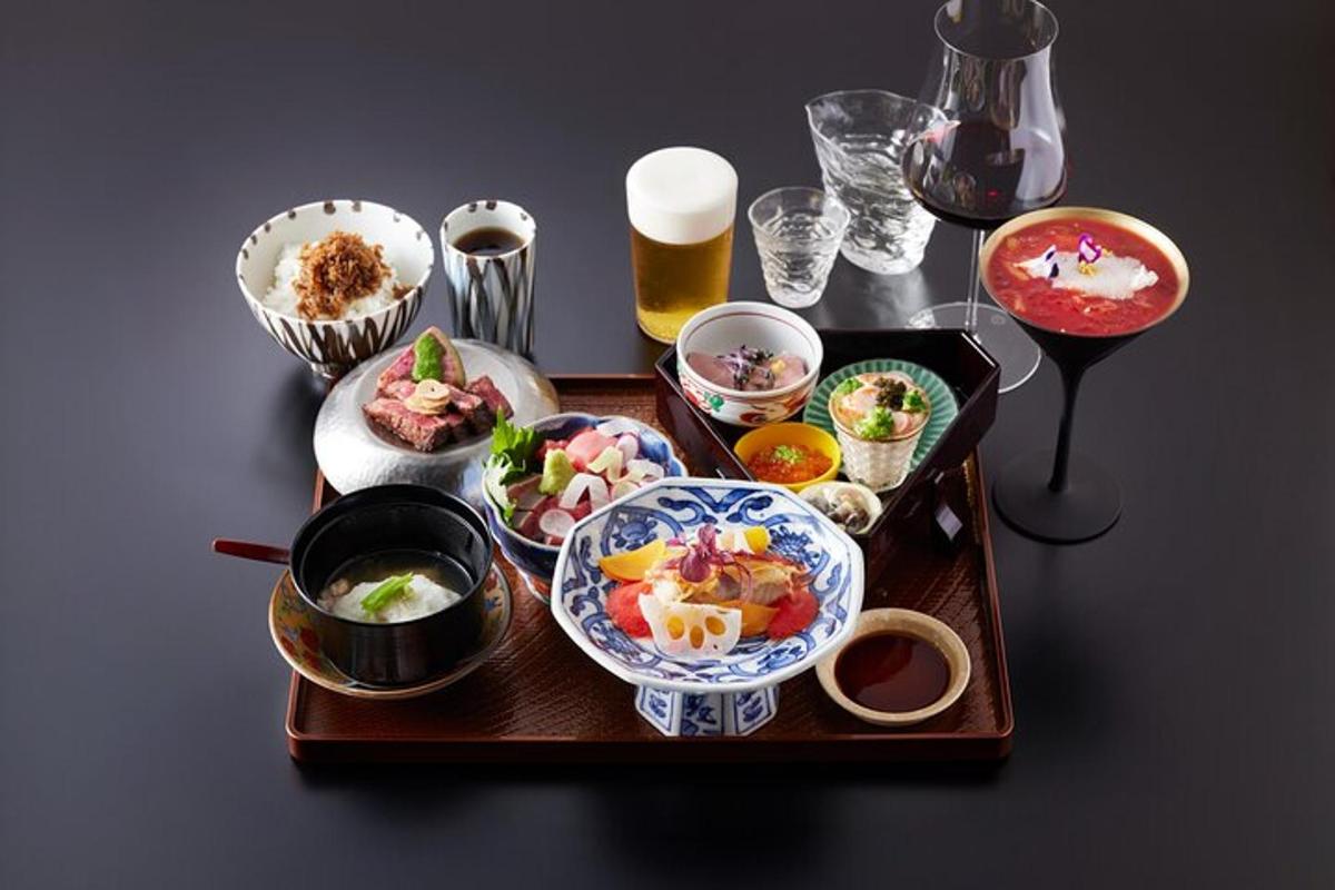 a table with a tray of food and bowls of food