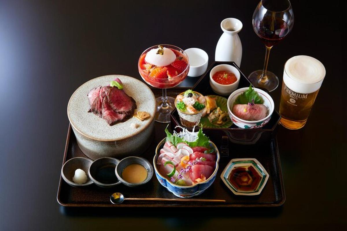 a table topped with a tray of food and drinks