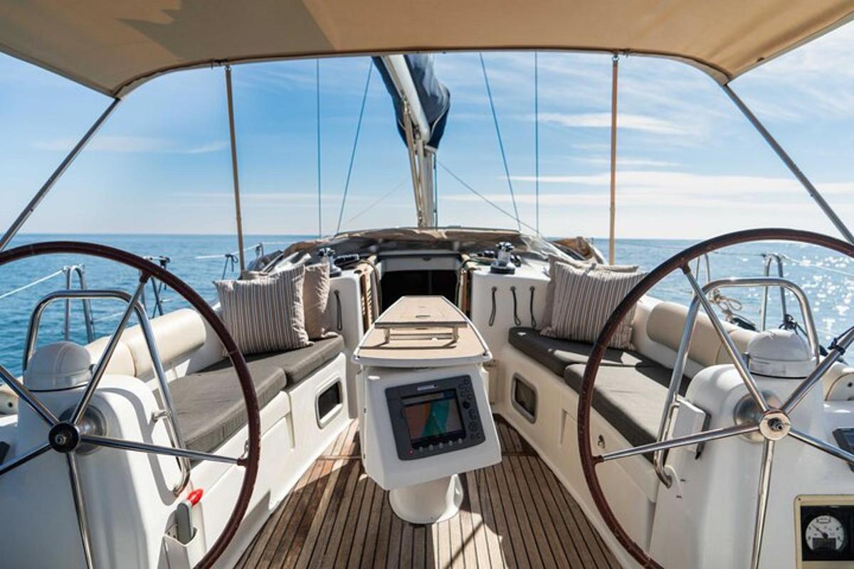a boat with a monitor sitting on the deck