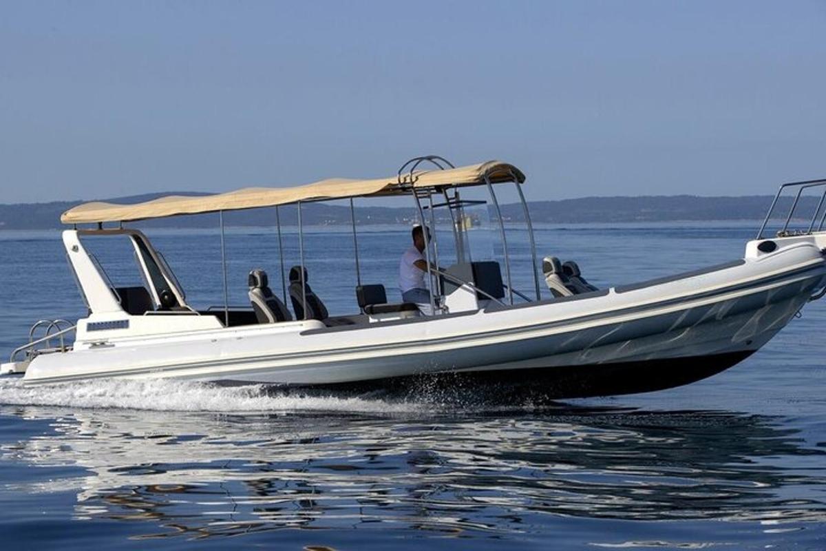 a man driving a boat on the water