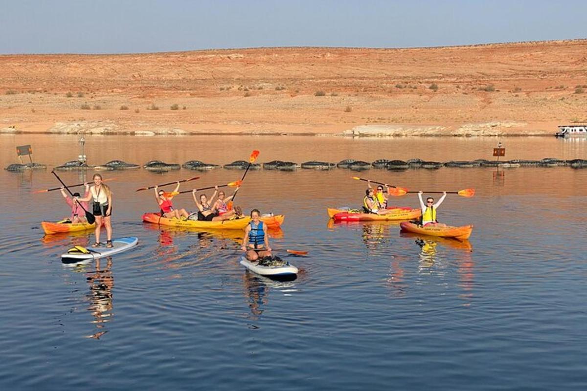 a group of people in kayaks in the water