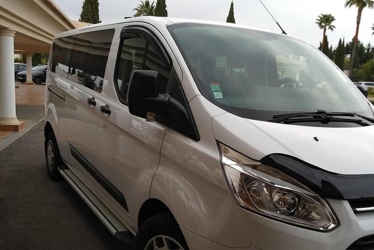 a white van parked in a parking lot