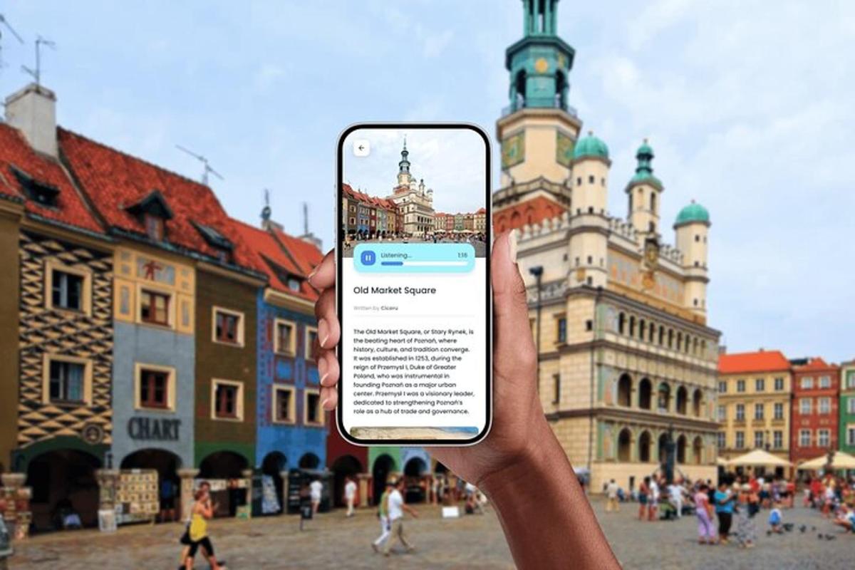 inimene, kes hoiab hoone ees mobiiltelefoni käes