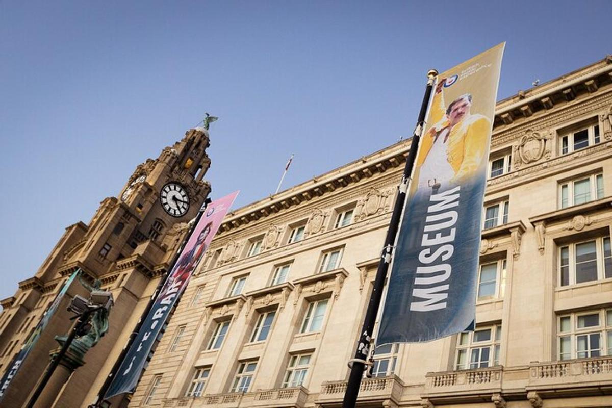 a building with a clock tower and a banner on it