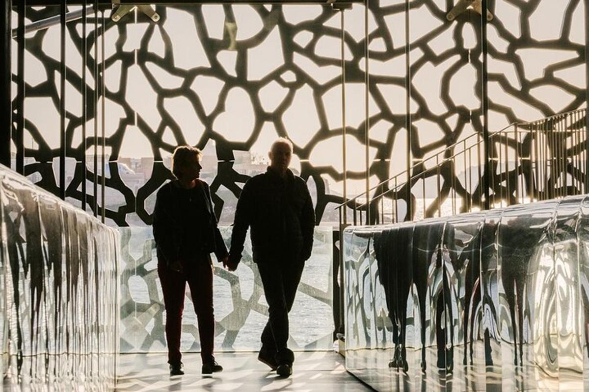 a man and a woman walking down a hallway