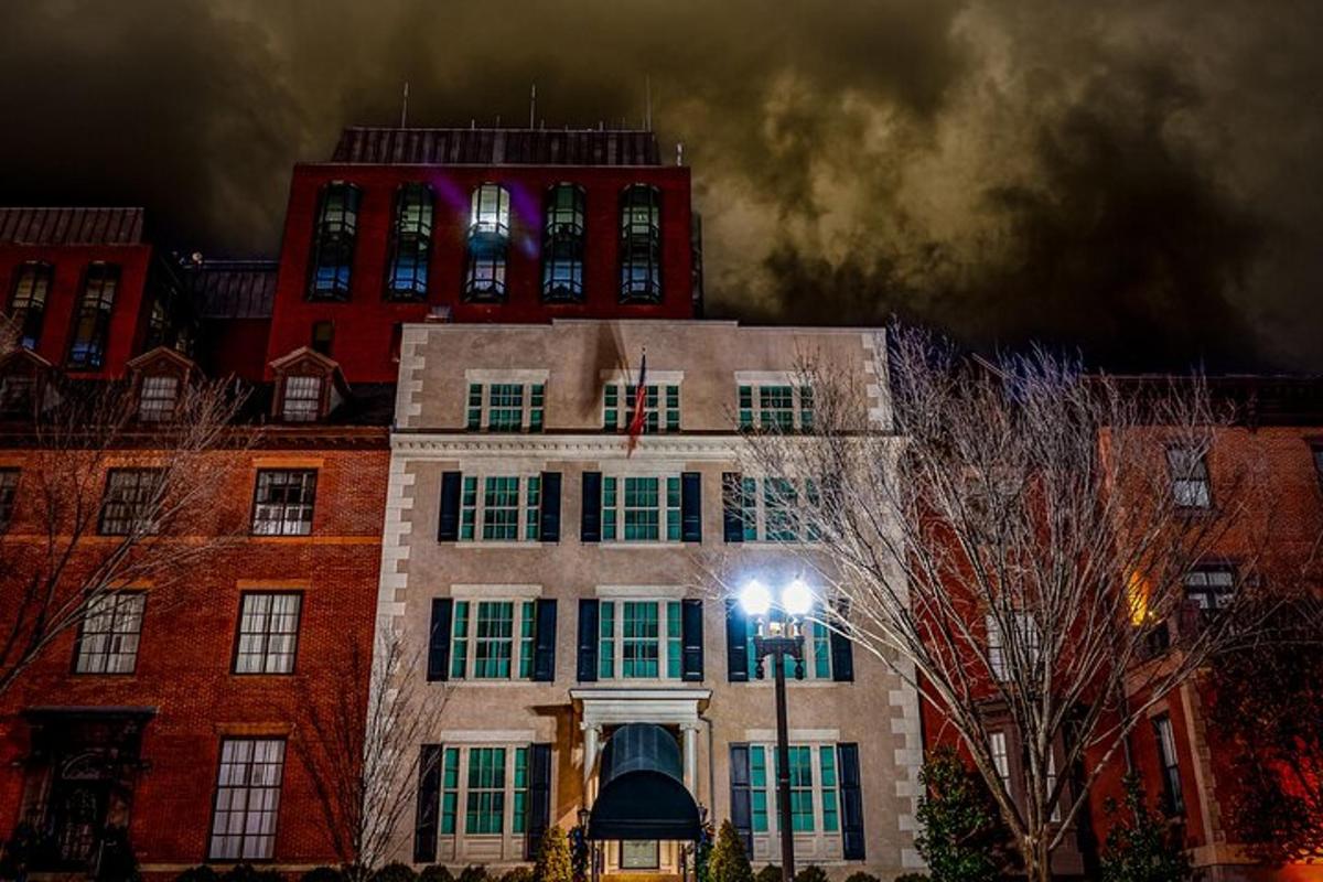 a large brick building with lights on top of it