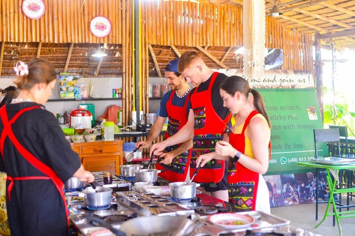 a group of people in a kitchen preparing food