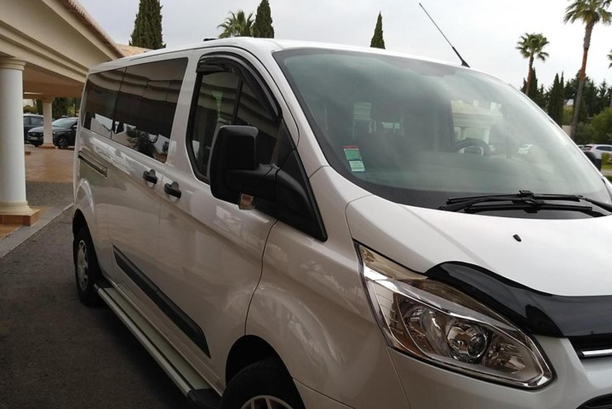 a white van parked in a parking lot