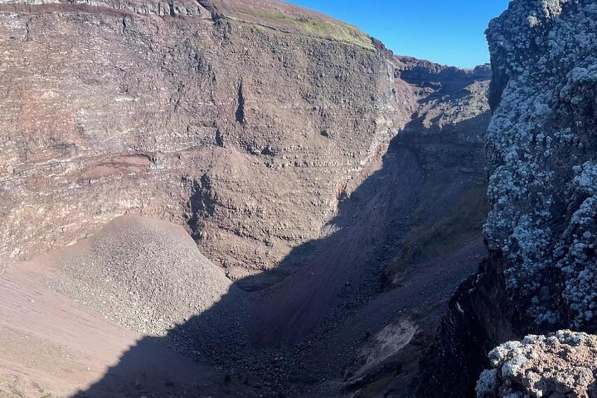 an aerial view of a canyon with a mountain