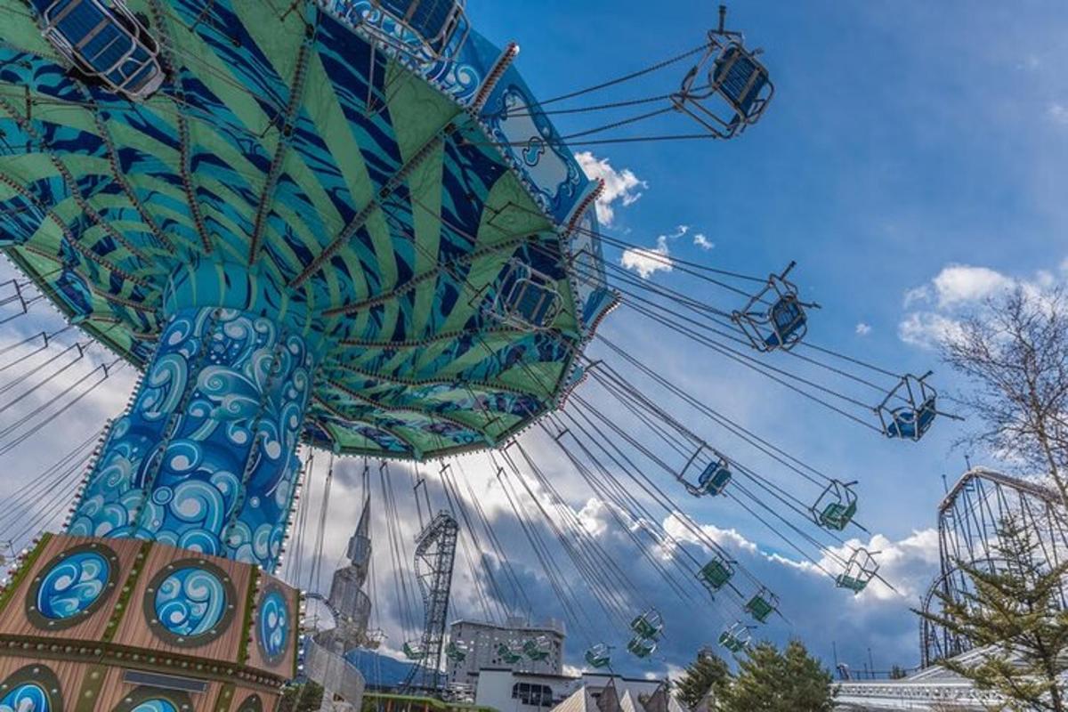 a ferris wheel with people riding on it