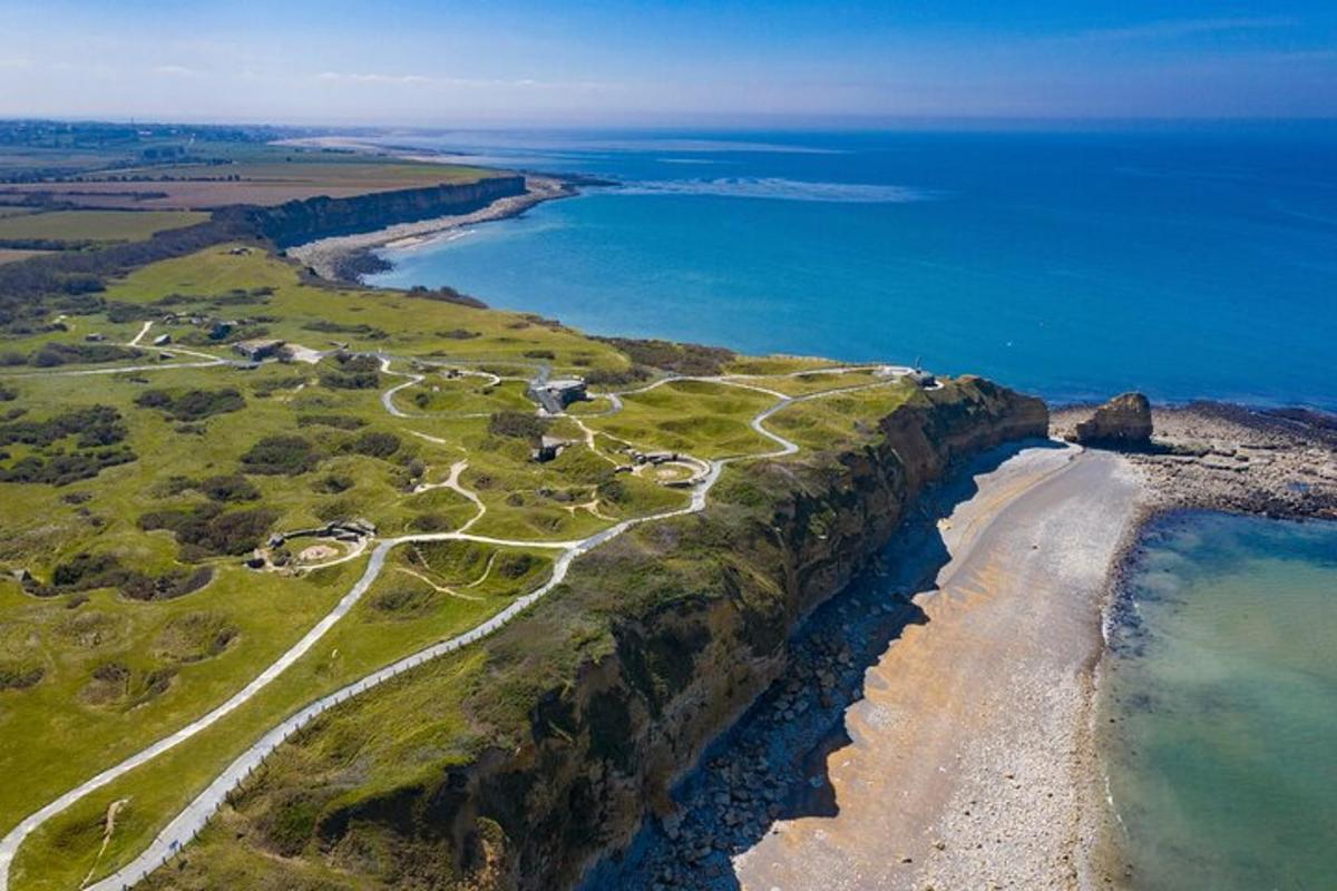 an aerial view of a beach and the ocean