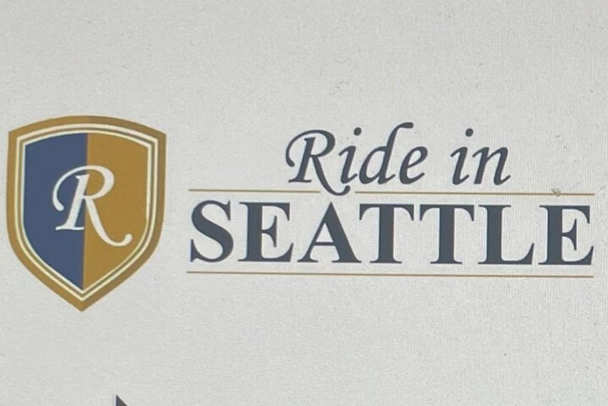 skilti fyrir hlutverk í Seattle með skjöld