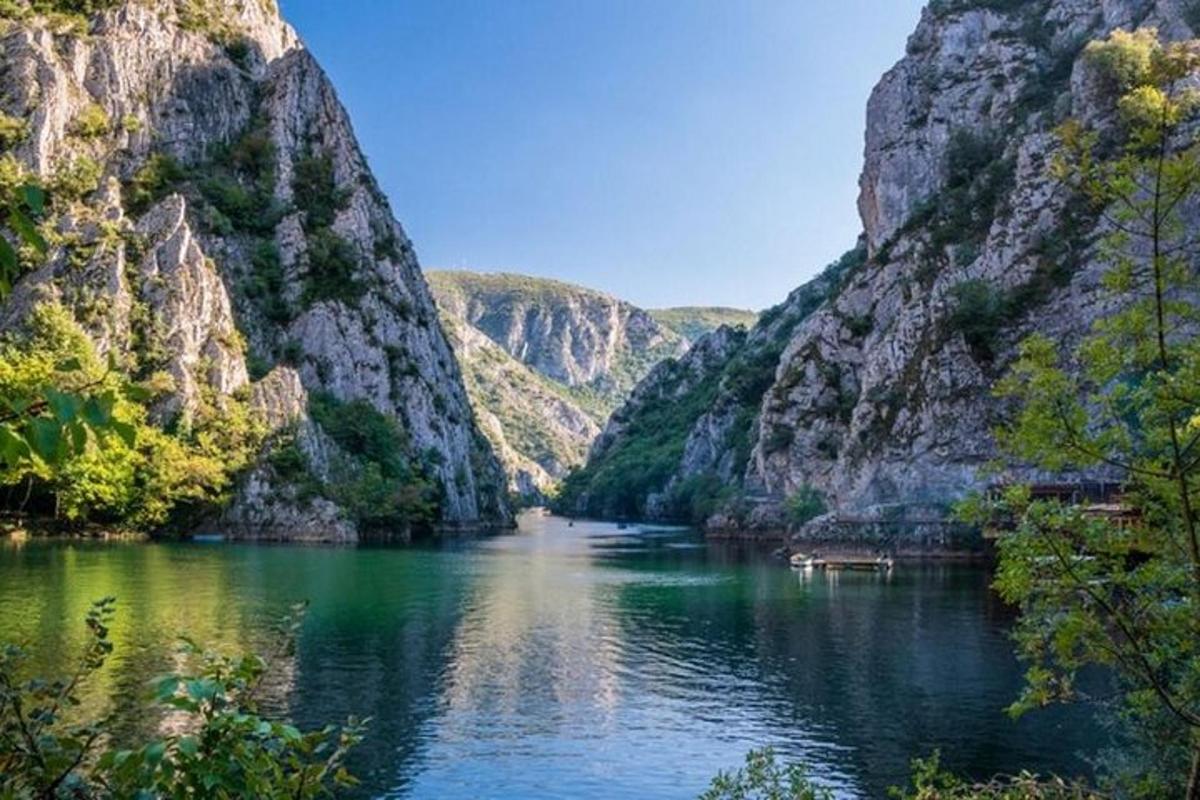 a view of a river between two mountains