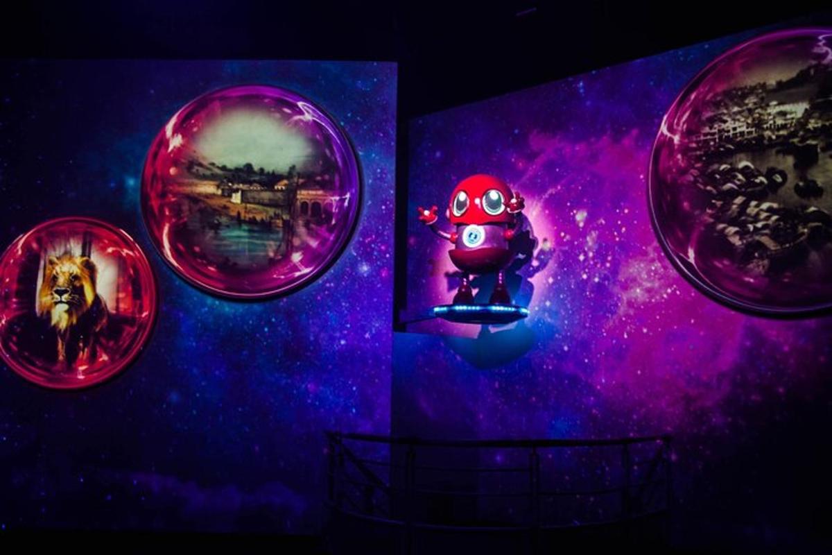 a book with four different pictures and a toy in a bubble