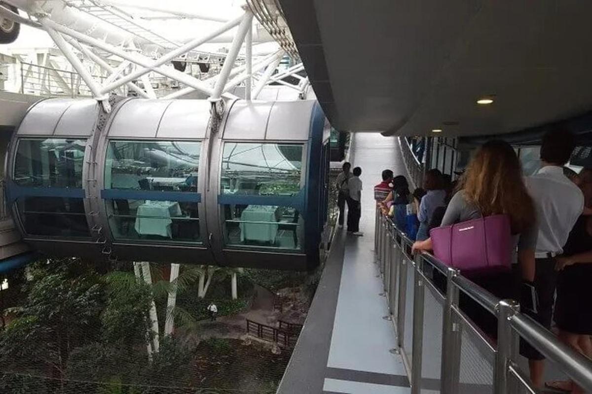 a group of people waiting on a train