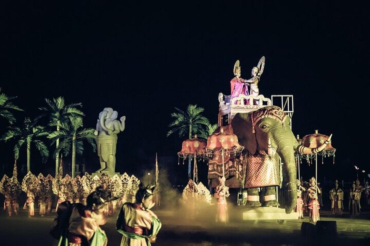 un carnevale con un elefante con una donna sopra