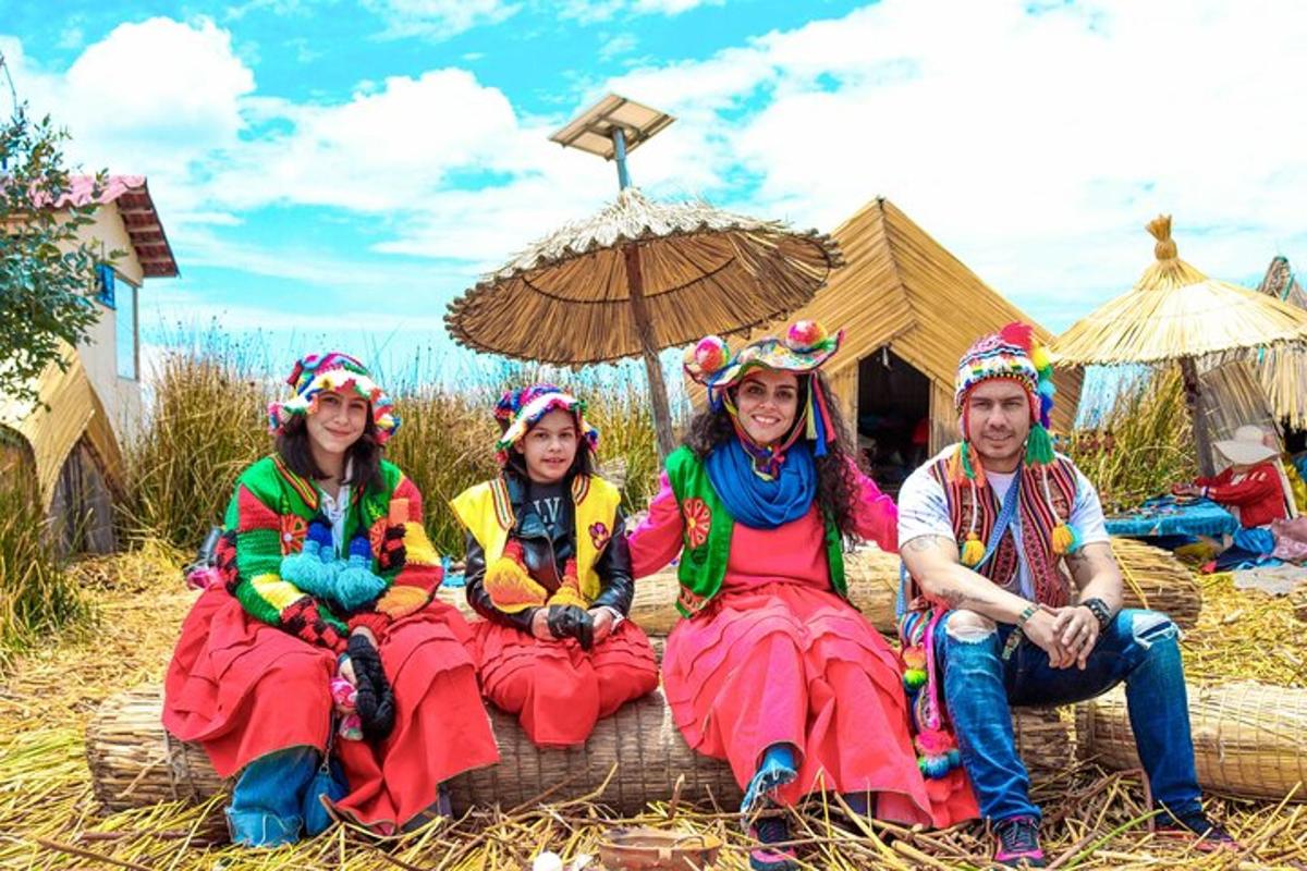 a group of women sitting on a log with umbrellas