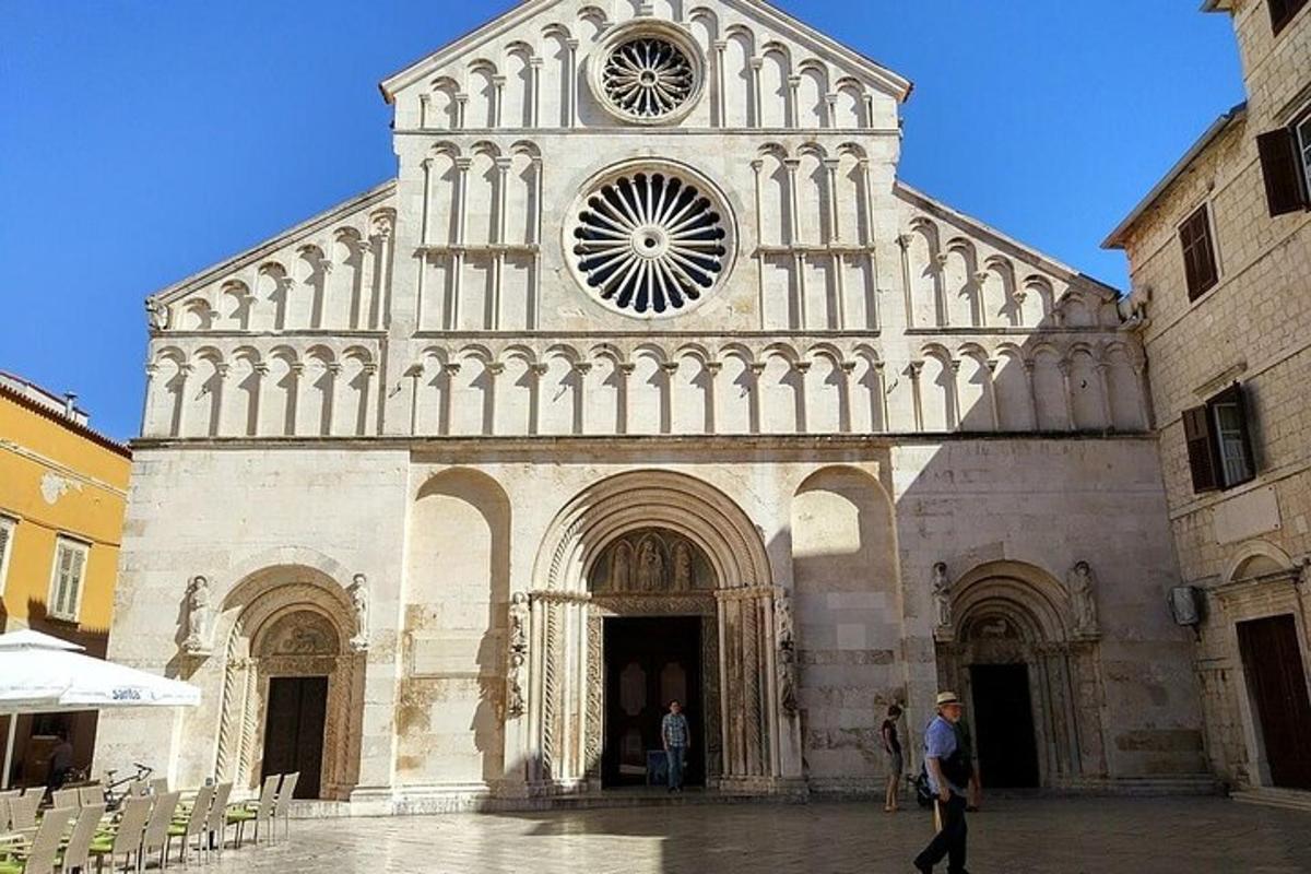 a large church with a clock on the front of it