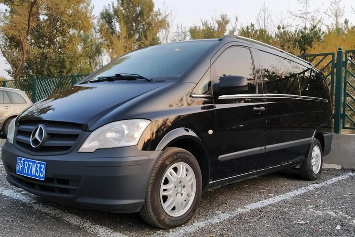a black van parked in a parking lot
