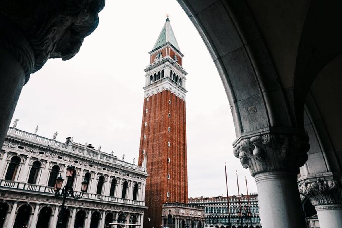 a tall clock tower in the middle of a building